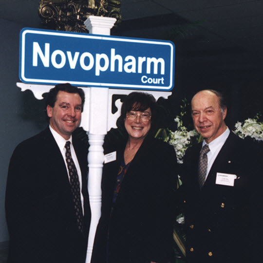 Novopharm Court - Edith Montgomery, City Councillor for Ward 14, presented a street sign to Dan and then-president Dr. Jacques Messier.