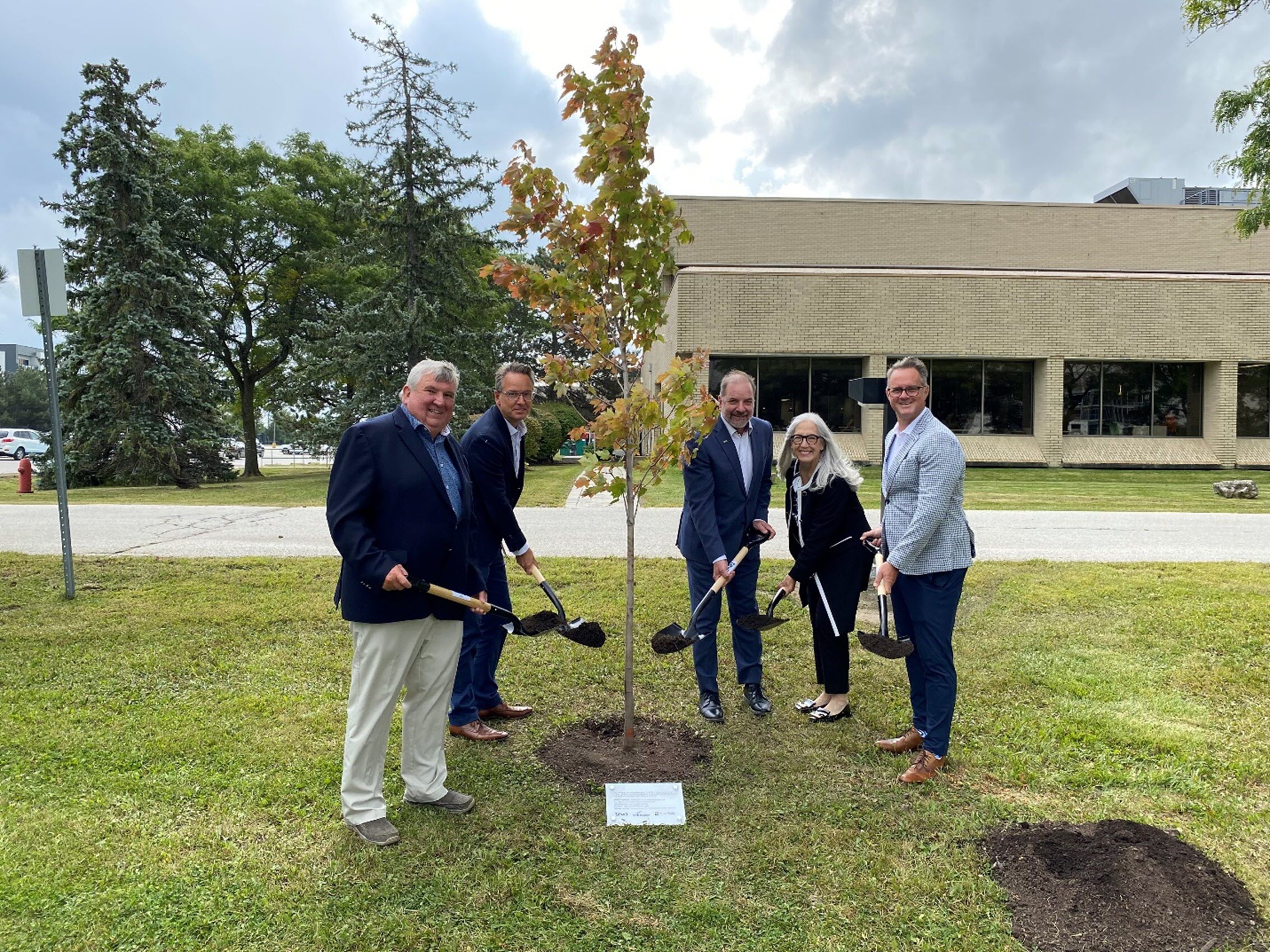 Planting a tree on the grounds of Teva’s Stouffville manufacturing site to commemorate the guests’ visit.jpg