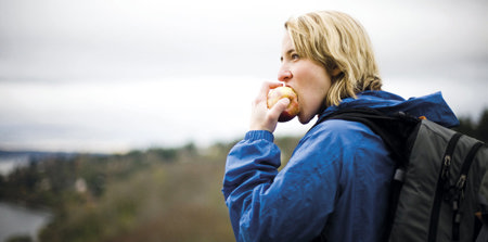 Woman travel and eating apple
