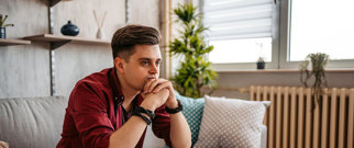 Young caregiver struggling with his emotions as responsibilities pile up